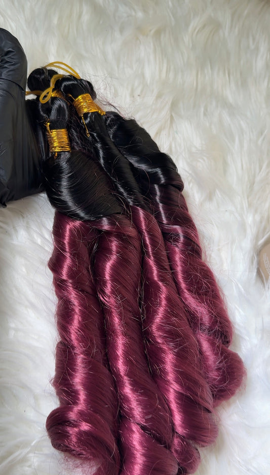 Three bundles of ombre burgundy French Curls braid